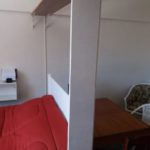 Cama e sala do apartamento de Copacabana - Rio Up